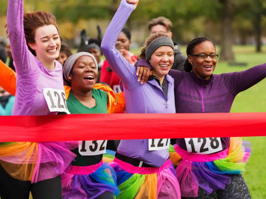 Women celebrating their First Day Run - one of the many New year fundraising ideas