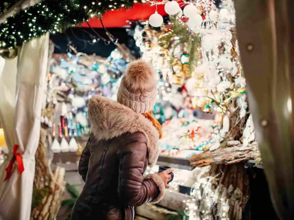 Woman visiting a local fair at Christmas